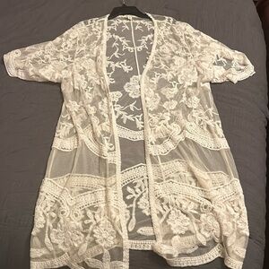 Knee Length Lace Cardigan from a boutique